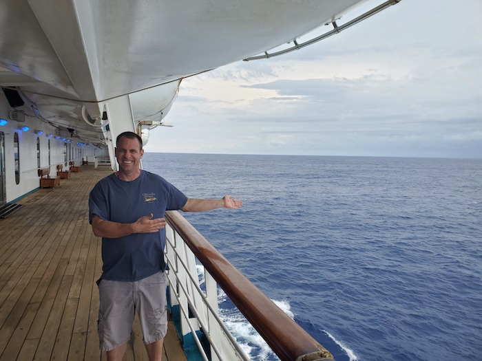 cruise guest enjoying the ocean view